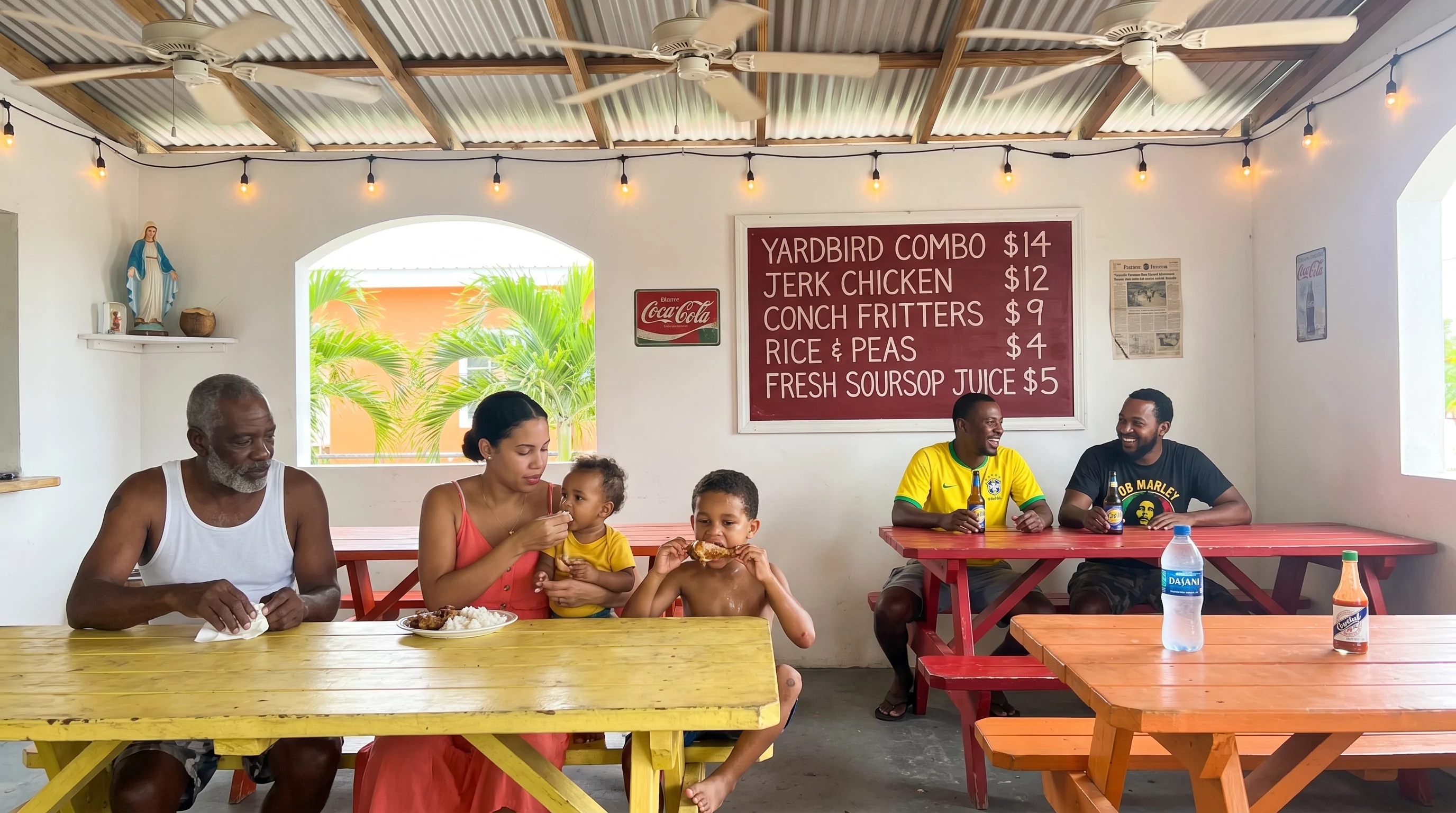 COCO COOP interior dining porch with locals eating fried chicken under ceiling fans and string lights